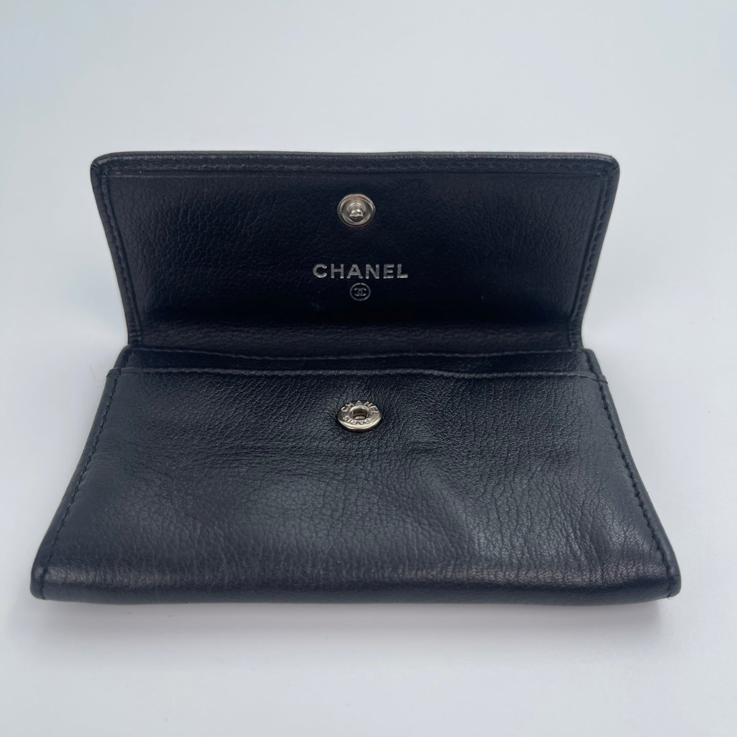 Chanel Black Camellia Embossed Card Holder [Used]