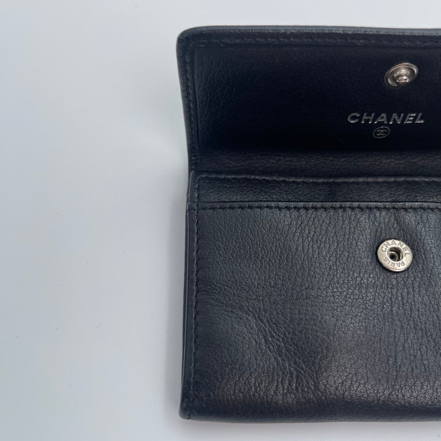 Chanel Black Camellia Embossed Card Holder [Used]