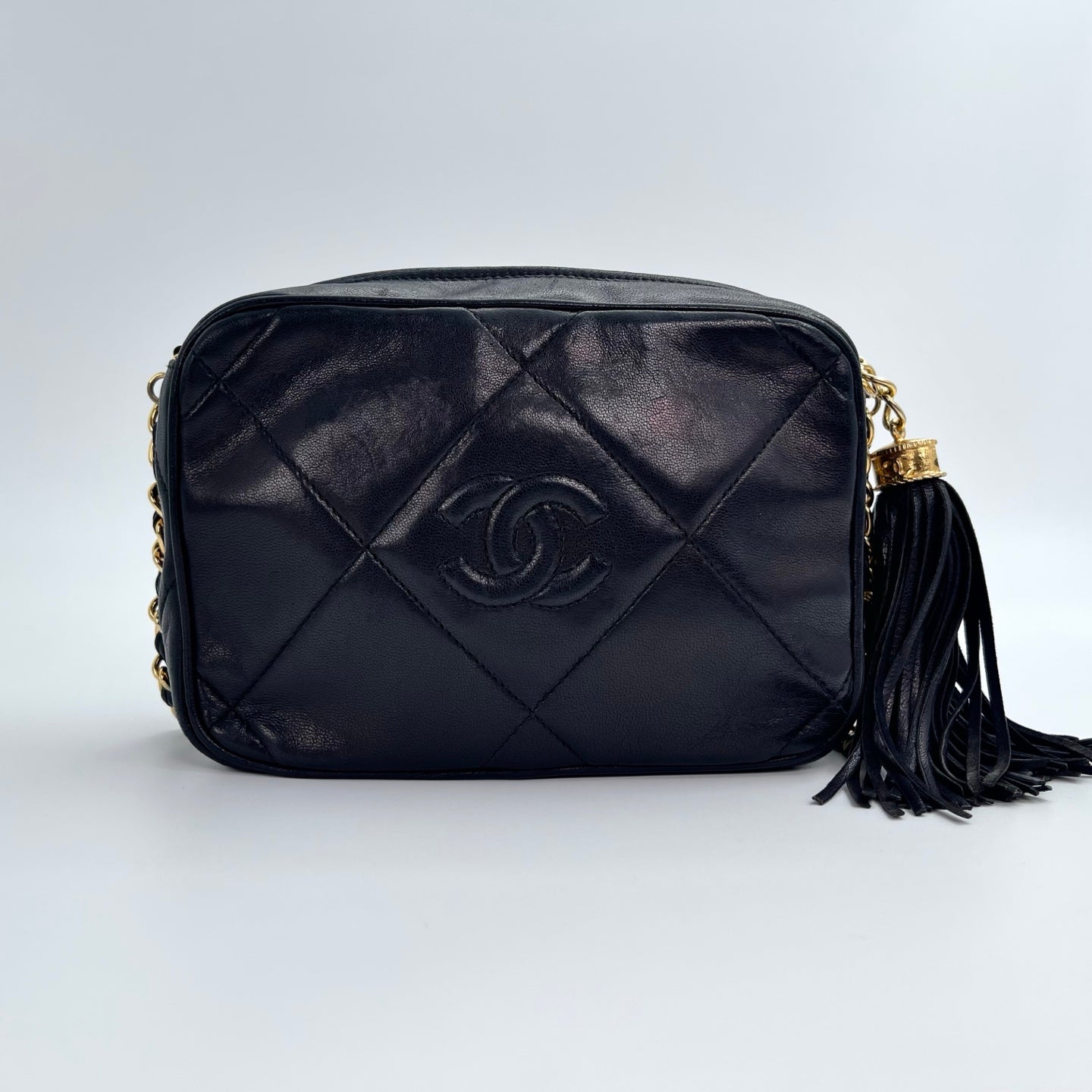 Chanel Black Lambskin Double-Sided CC Tassel Chain Camera Bag – Black/Gold [Used]