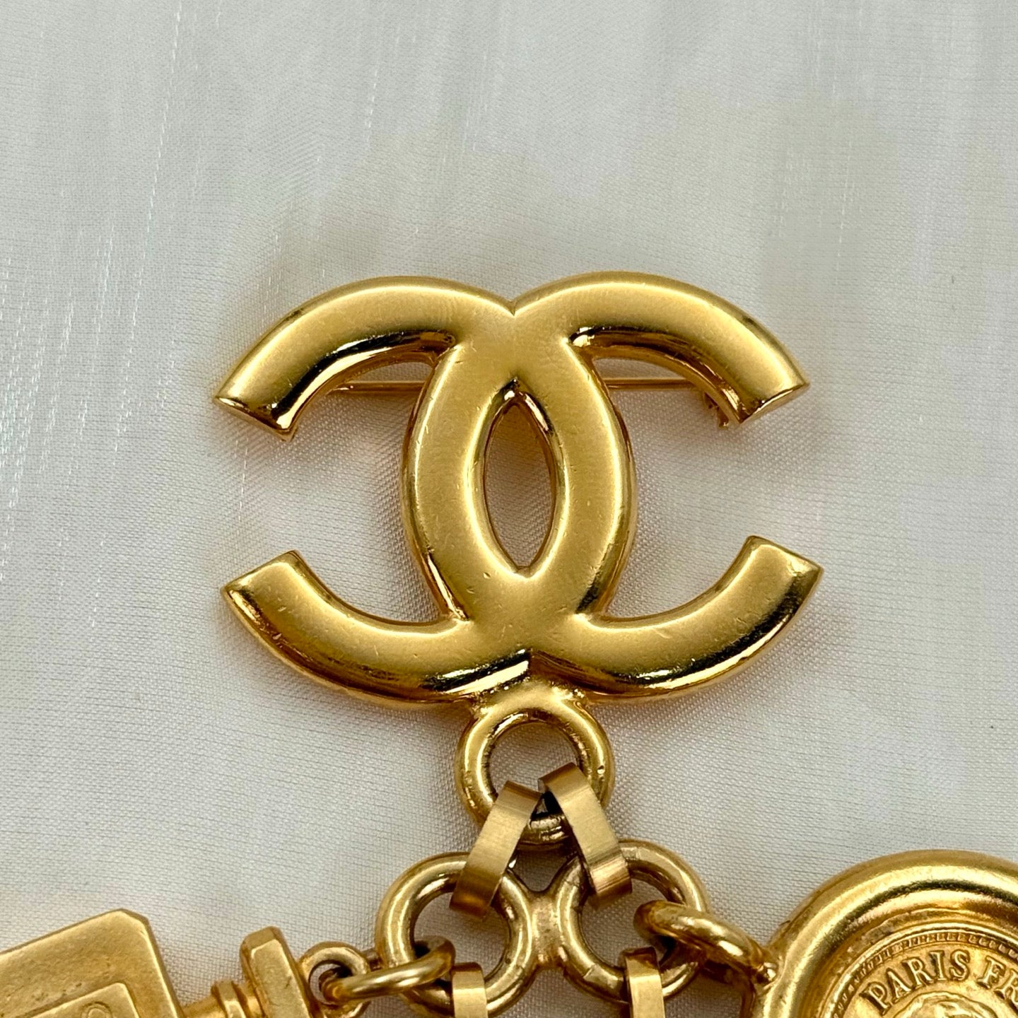 Chanel Vintage 24K Gold-Plated Multi-Motif Charm Statement Brooch [Used]