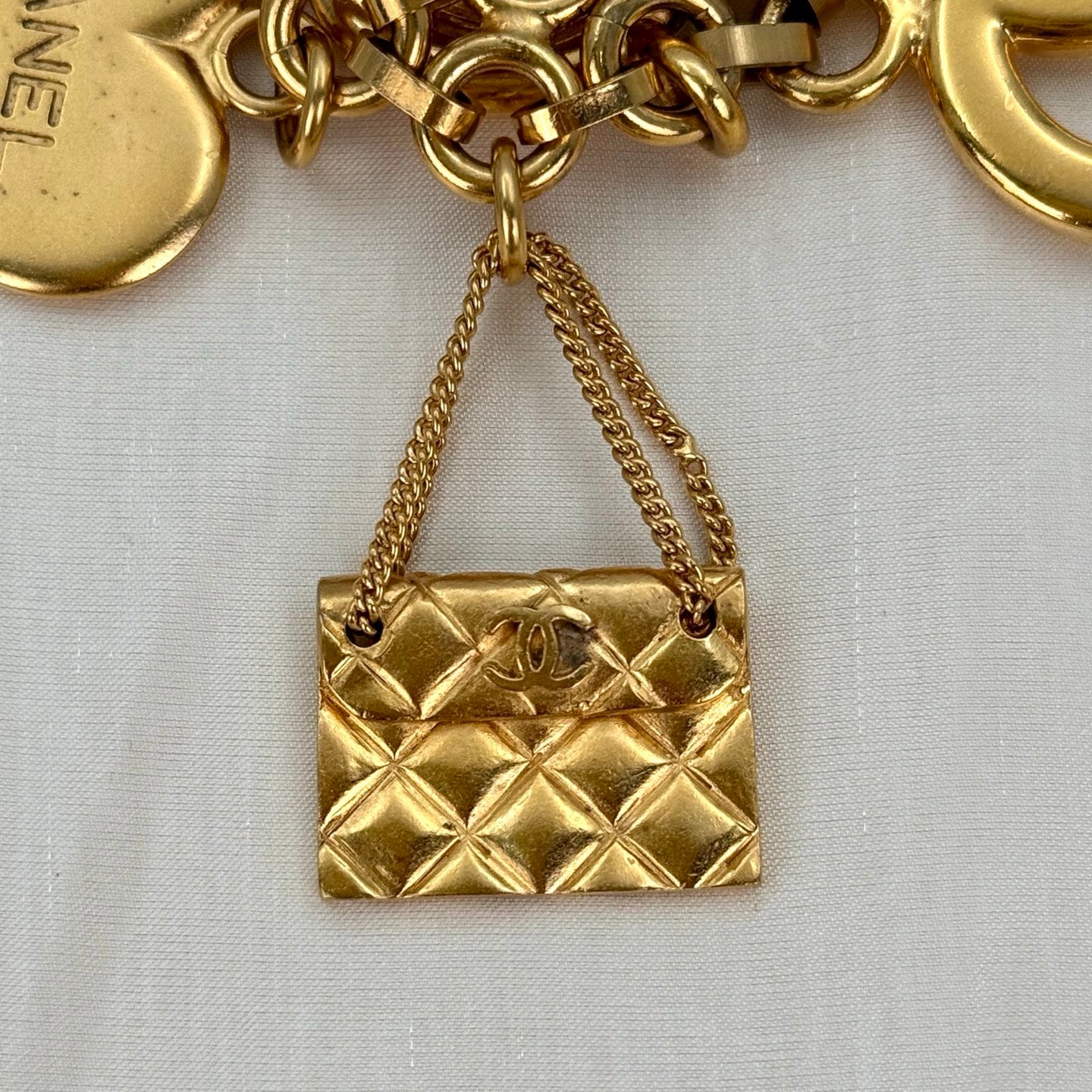 Chanel Vintage 24K Gold-Plated Multi-Motif Charm Statement Brooch [Used]