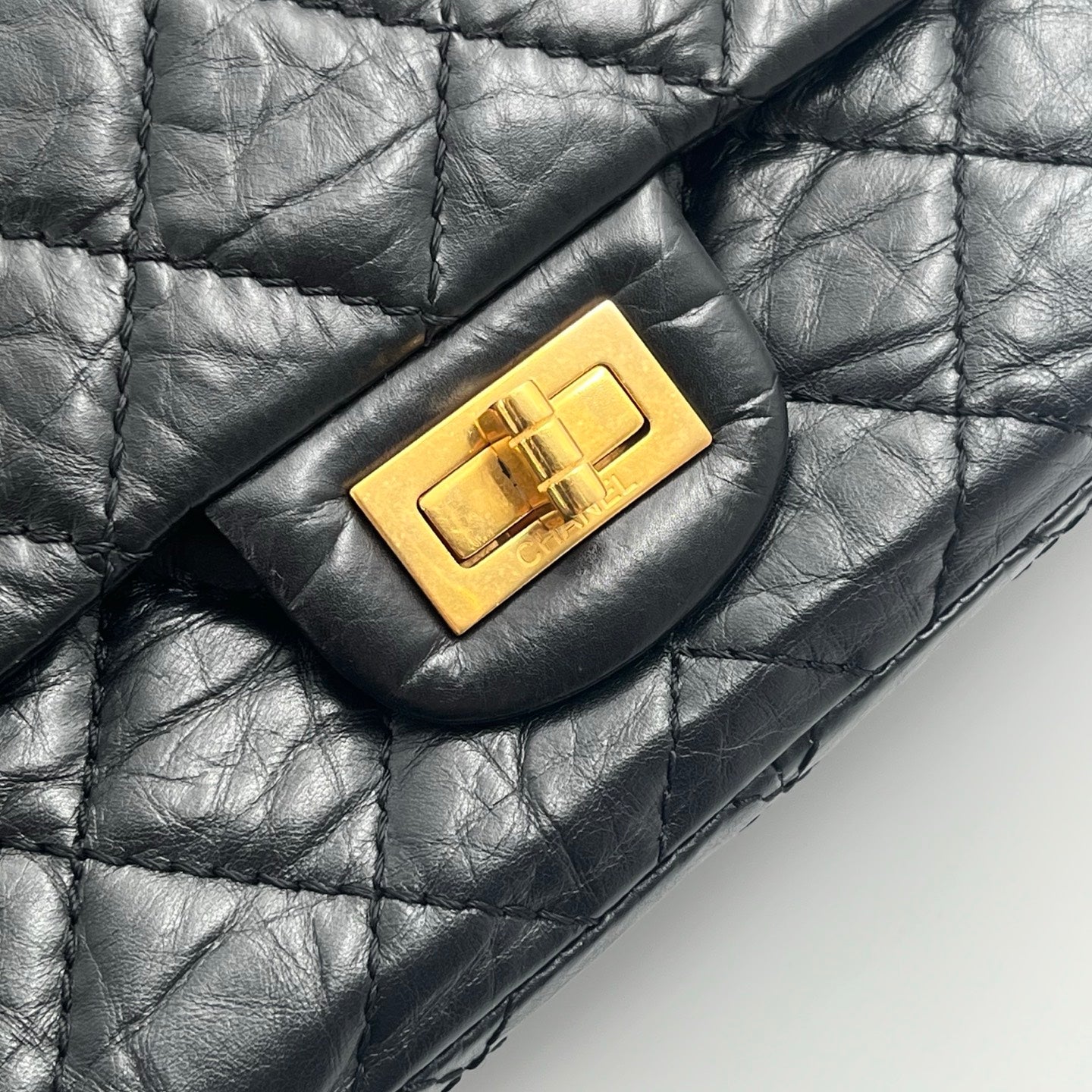 CHANEL Black Aged Calfskin Quilted 2.55 Reissue 225 Flap Bag [Used]