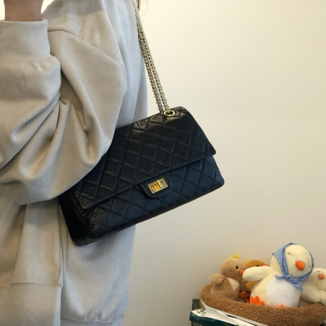 CHANEL Black Aged Calfskin Quilted 2.55 Reissue 225 Flap Bag [Used]
