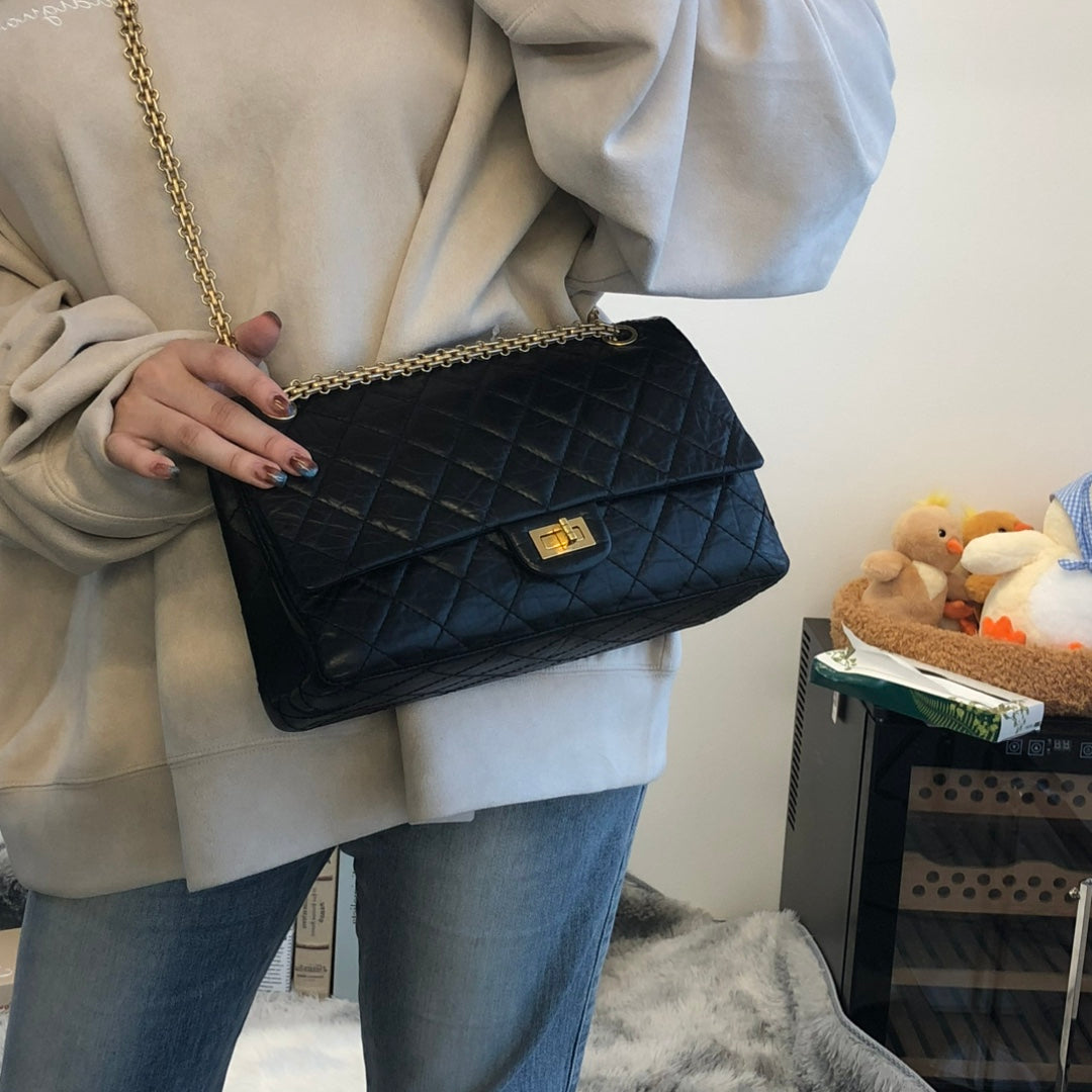 CHANEL Black Aged Calfskin Quilted 2.55 Reissue 225 Flap Bag [Used]