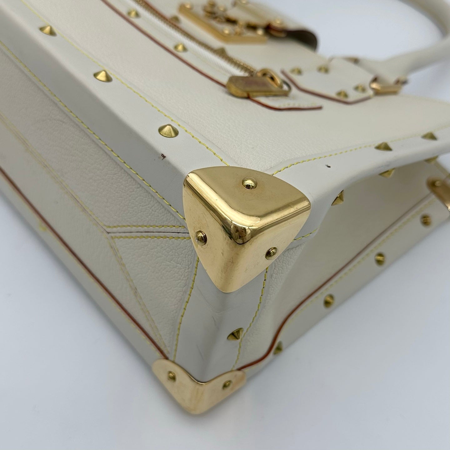 Louis Vuitton White Suhali Leather Studded Handbag with Gold Hardware [Used]