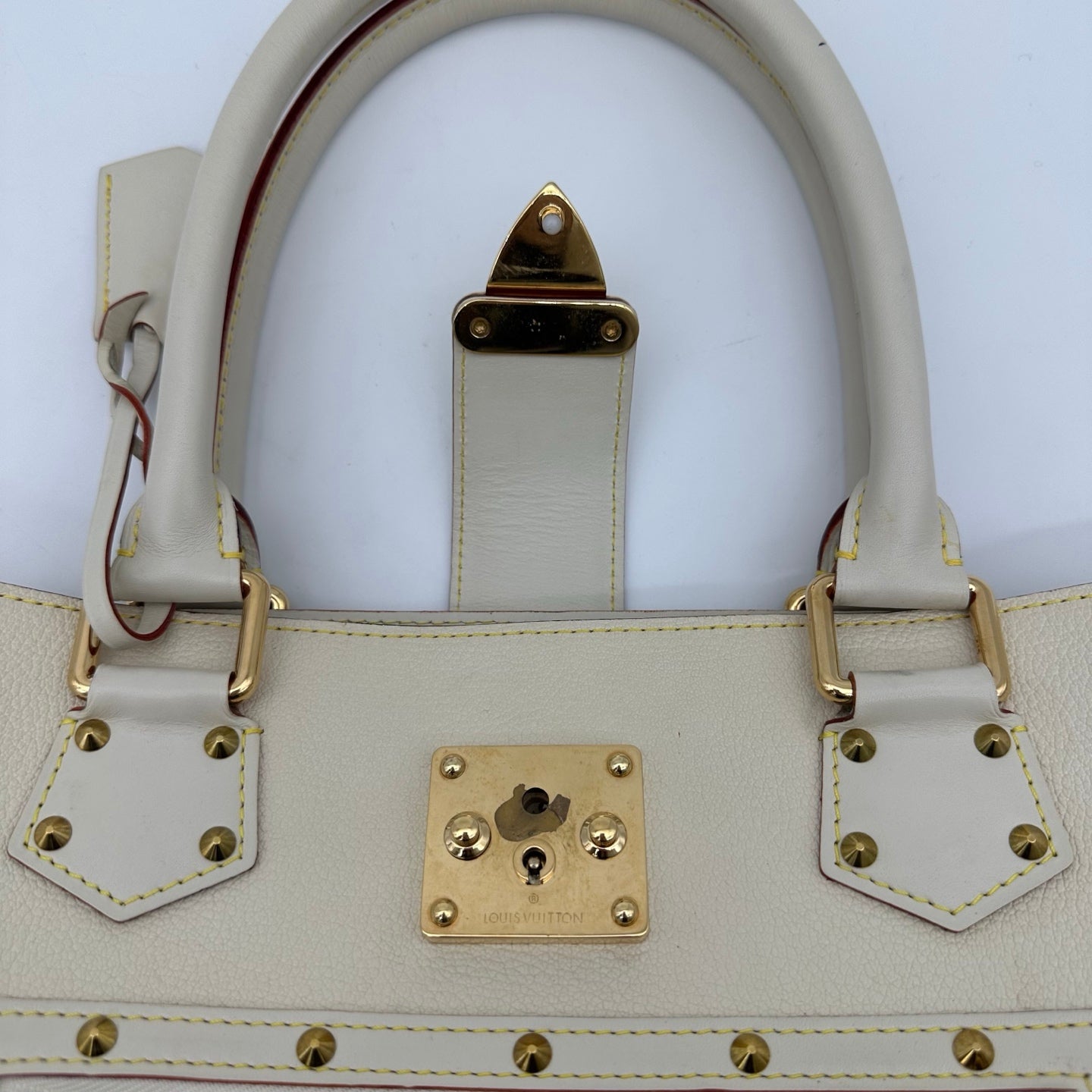 Louis Vuitton White Suhali Leather Studded Handbag with Gold Hardware [Used]