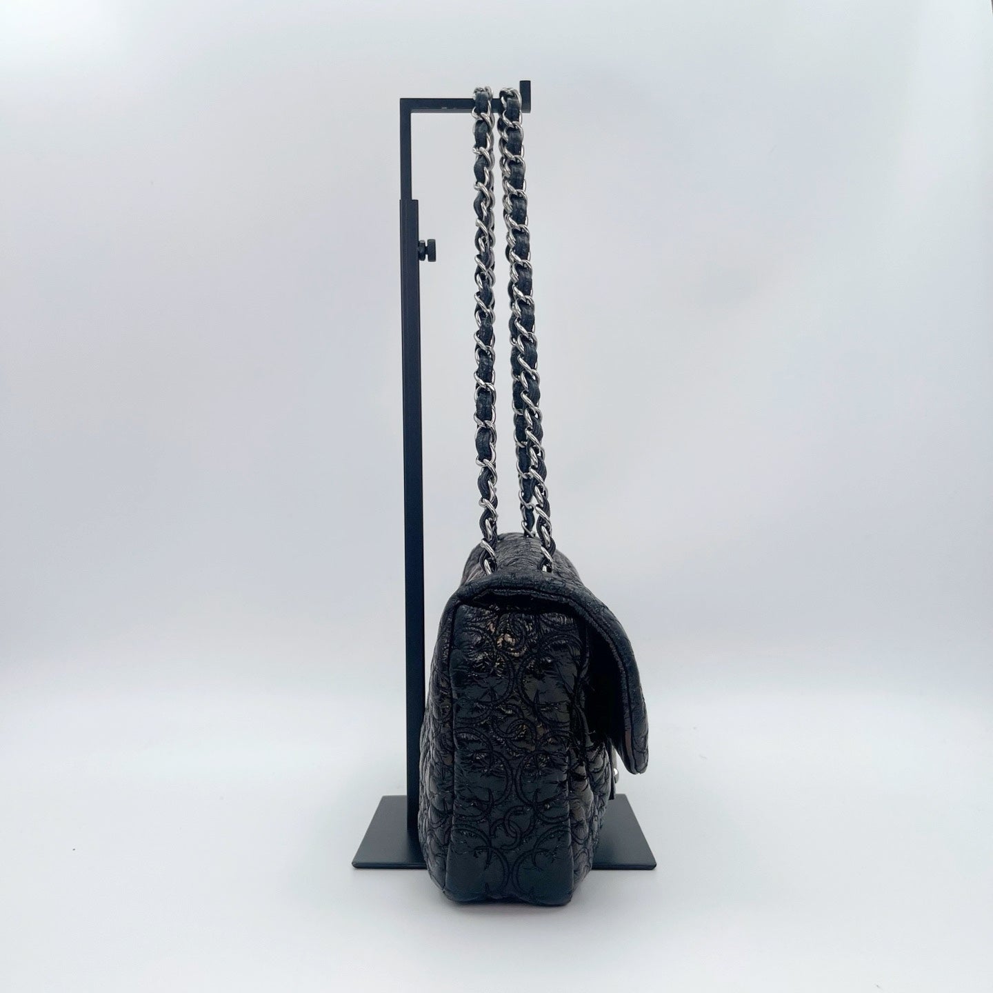 Chanel Paris-Moscow Limited Edition Black Patent Camellia Embossed Flap Chain Backpack [Used]