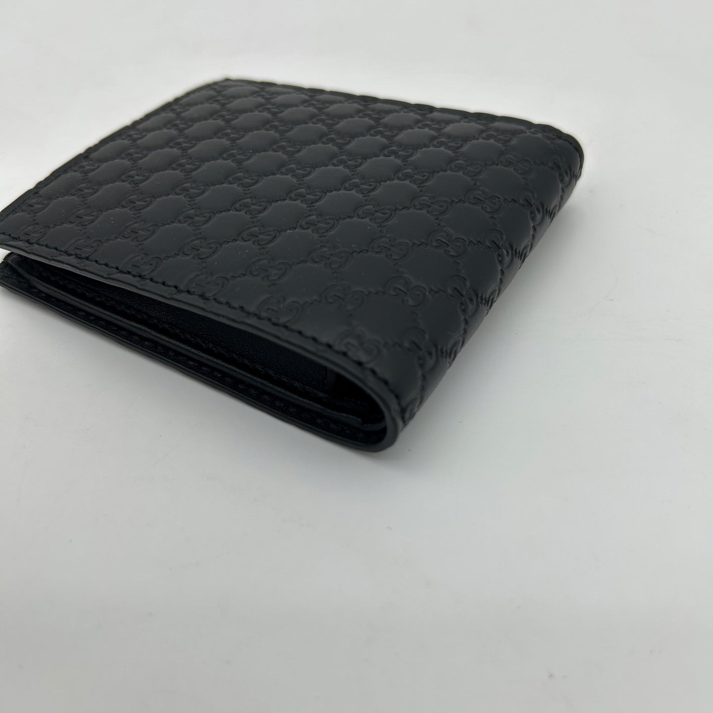 Gucci Guccissima Black Leather Bifold Wallet [Used]