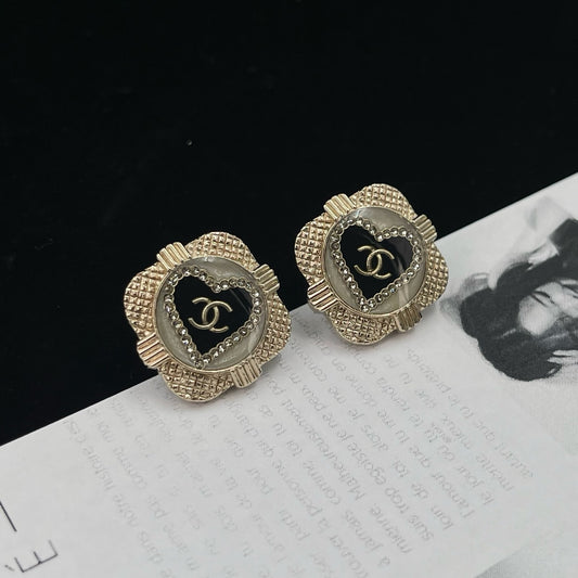 Chanel Métiers d’Art Black Gold Heart CC Earrings [Used]