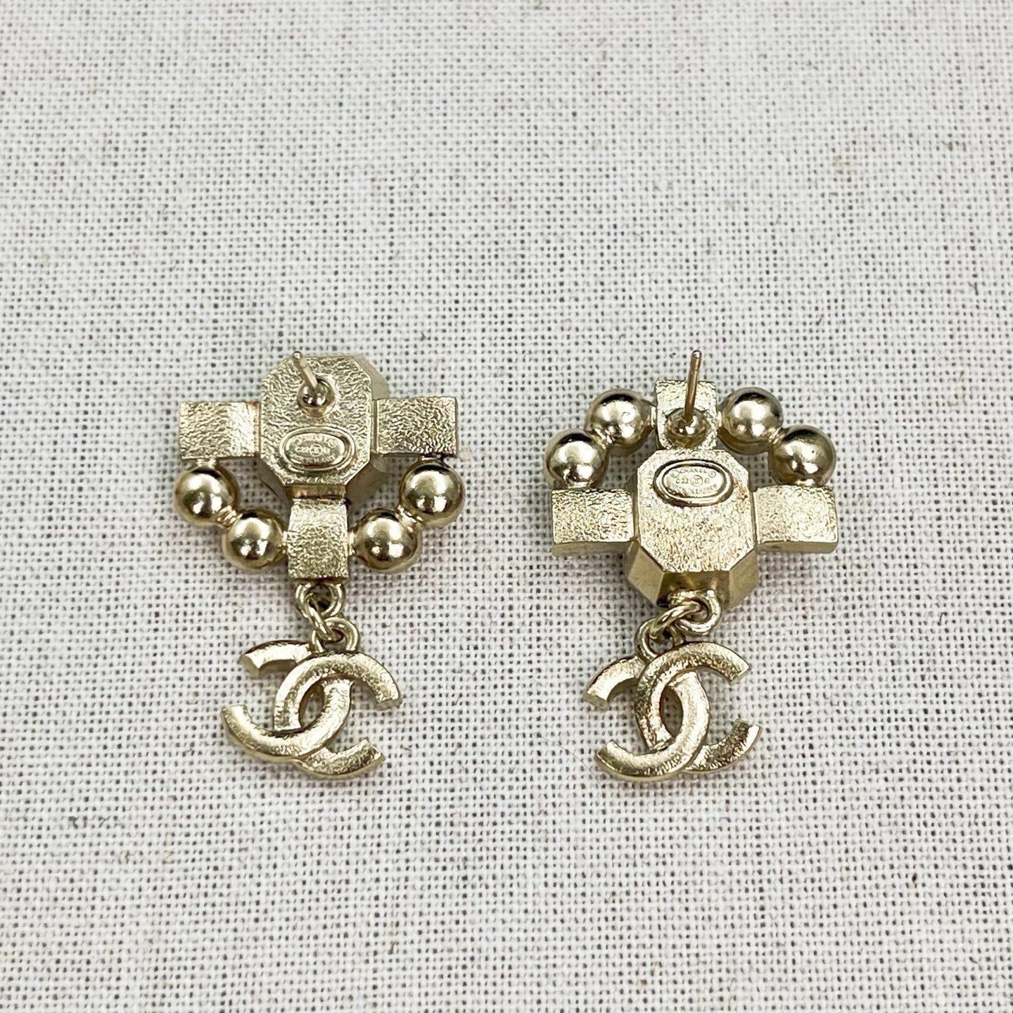 Chanel Light Gold Pink Rhinestone Asymmetrical CC Drop Earrings [Used]