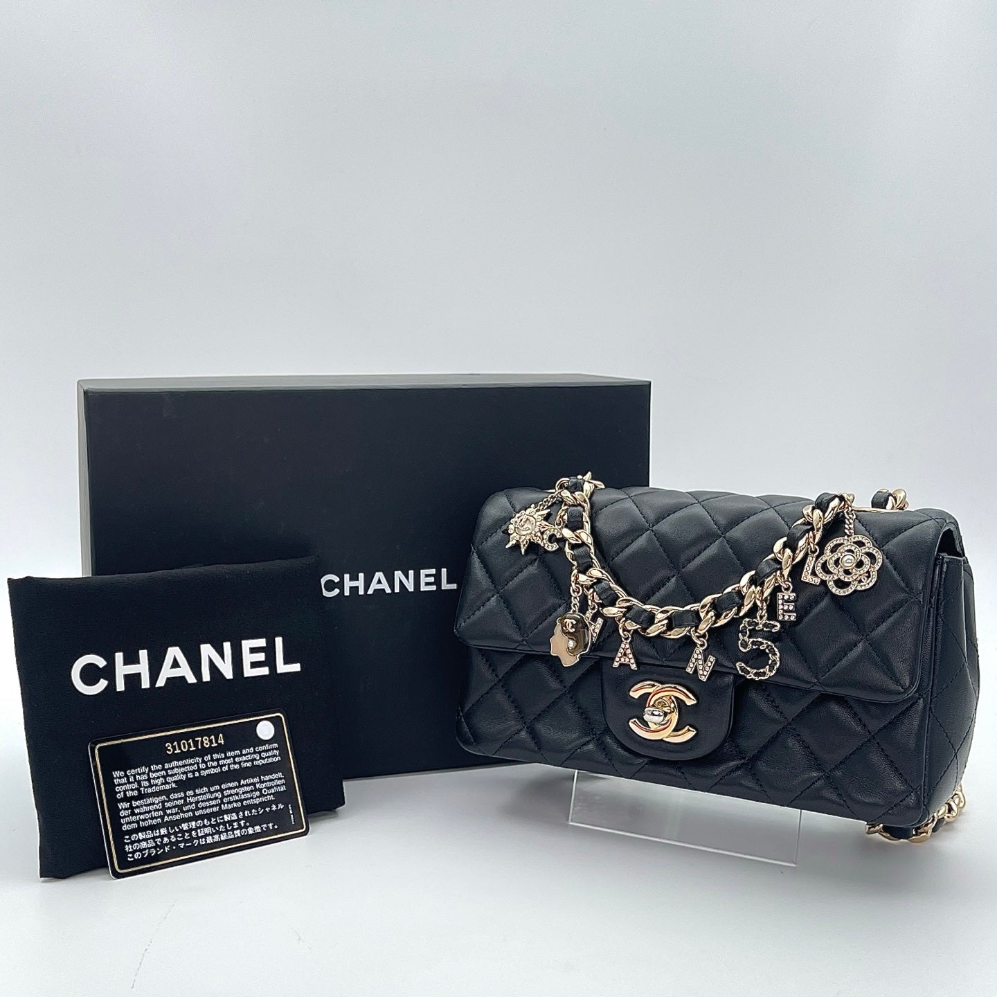 Chanel Black Mini Lambskin Coco Charms Rectangular Classic Flap Bag [Used]