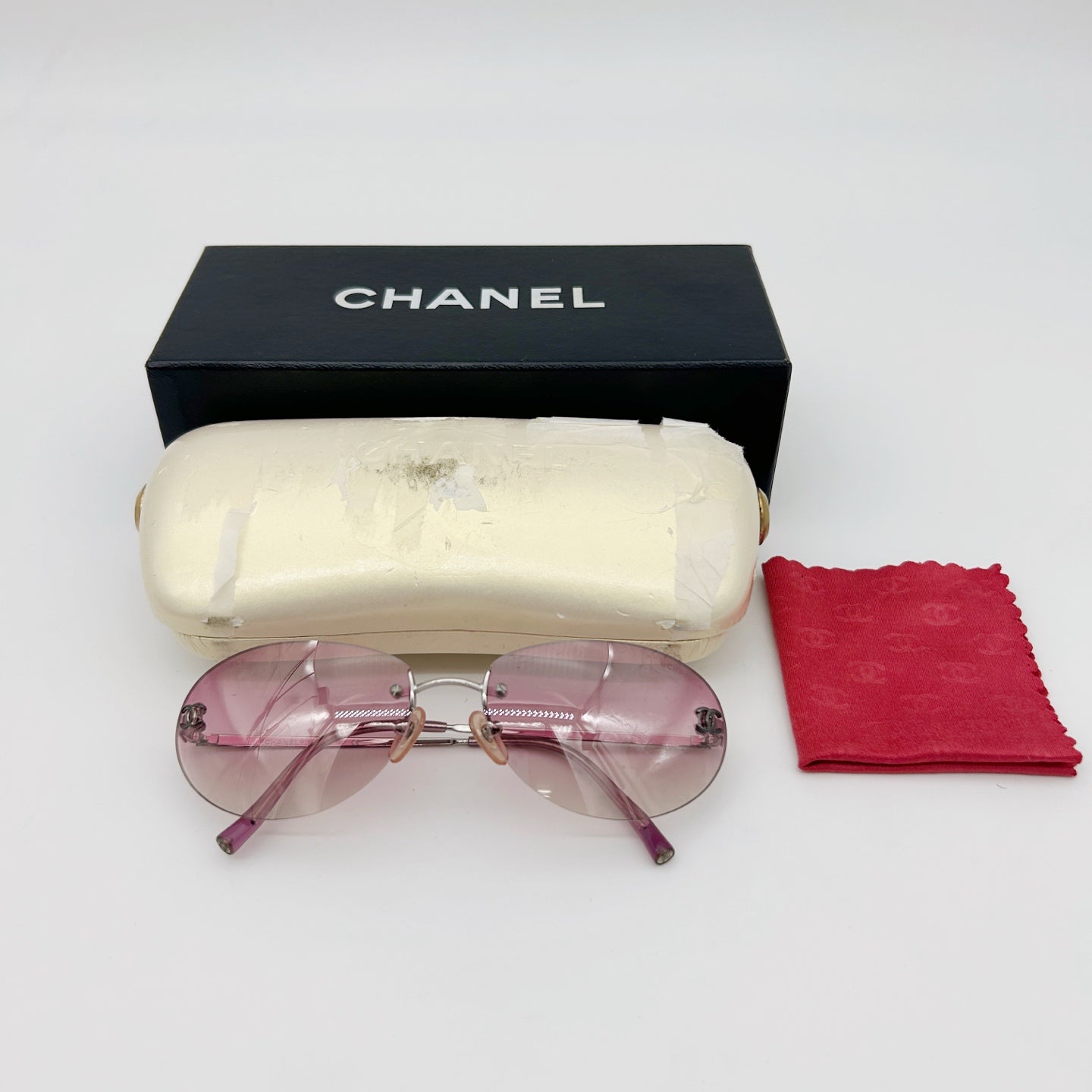CHANEL Y2K Pink Gradient Rimless Cat-Eye Sunglasses – Pink Gradient [Used]