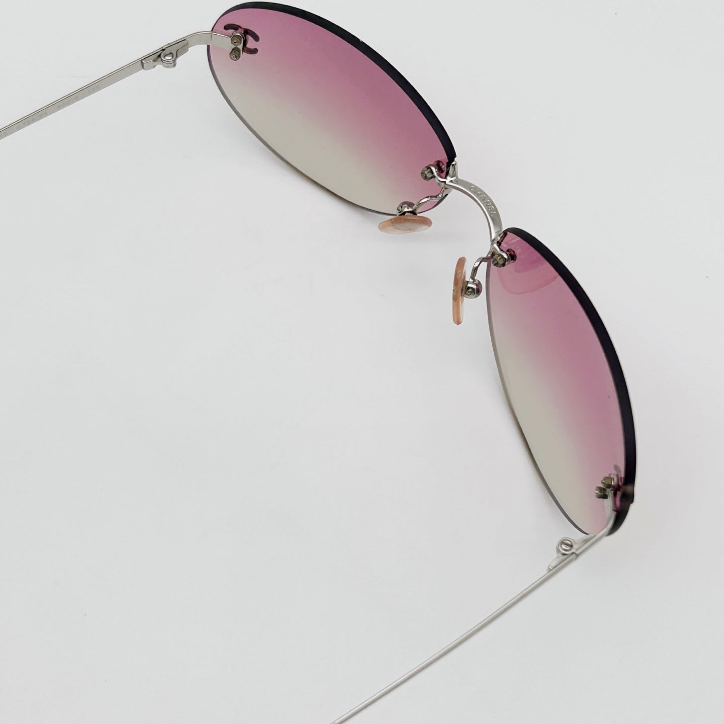 CHANEL Y2K Pink Gradient Rimless Cat-Eye Sunglasses – Pink Gradient [Used]