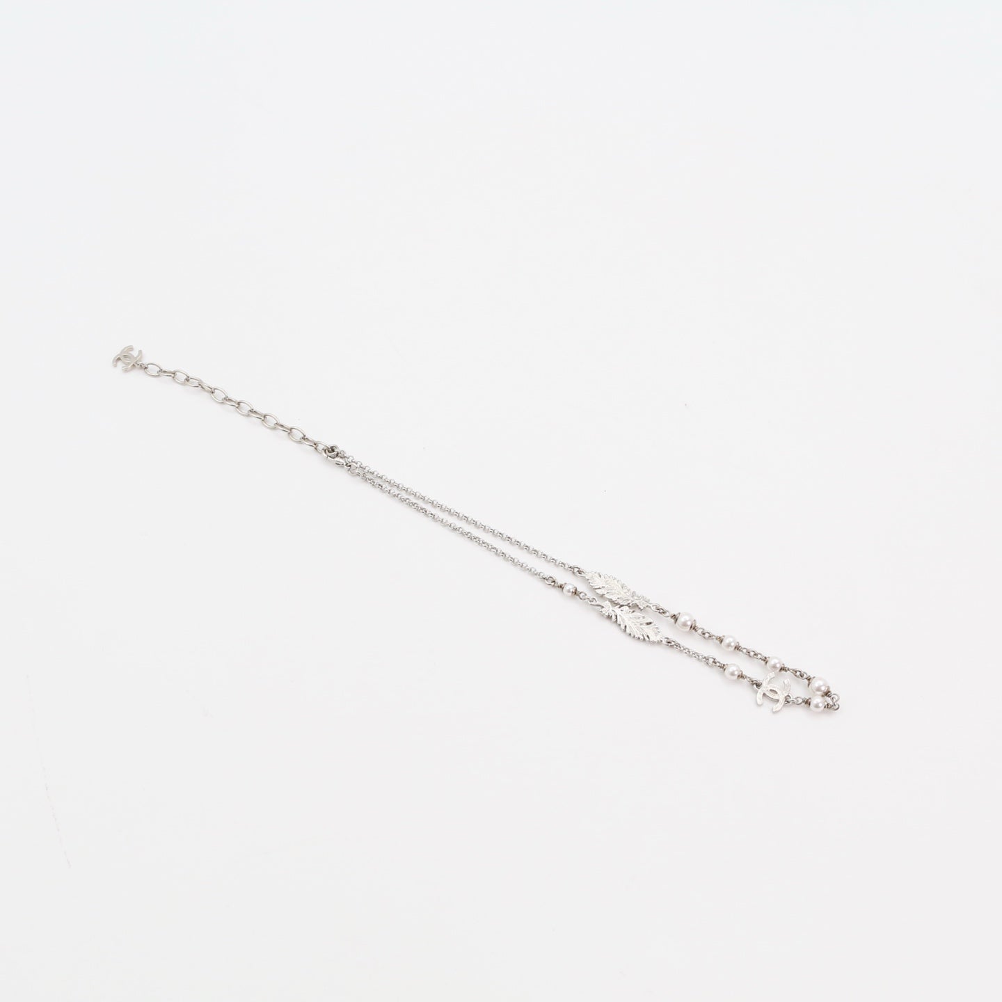 CHANEL Feather & CC Rhinestone Necklace – Silver (L25S) [Brand New]