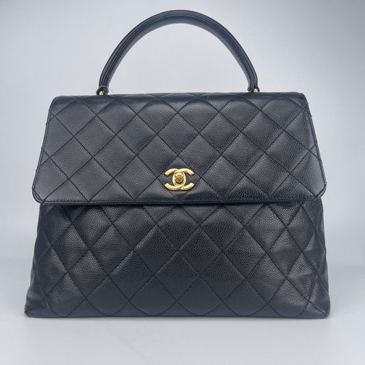 Chanel Black and Gold Kelly Handbag [Used]