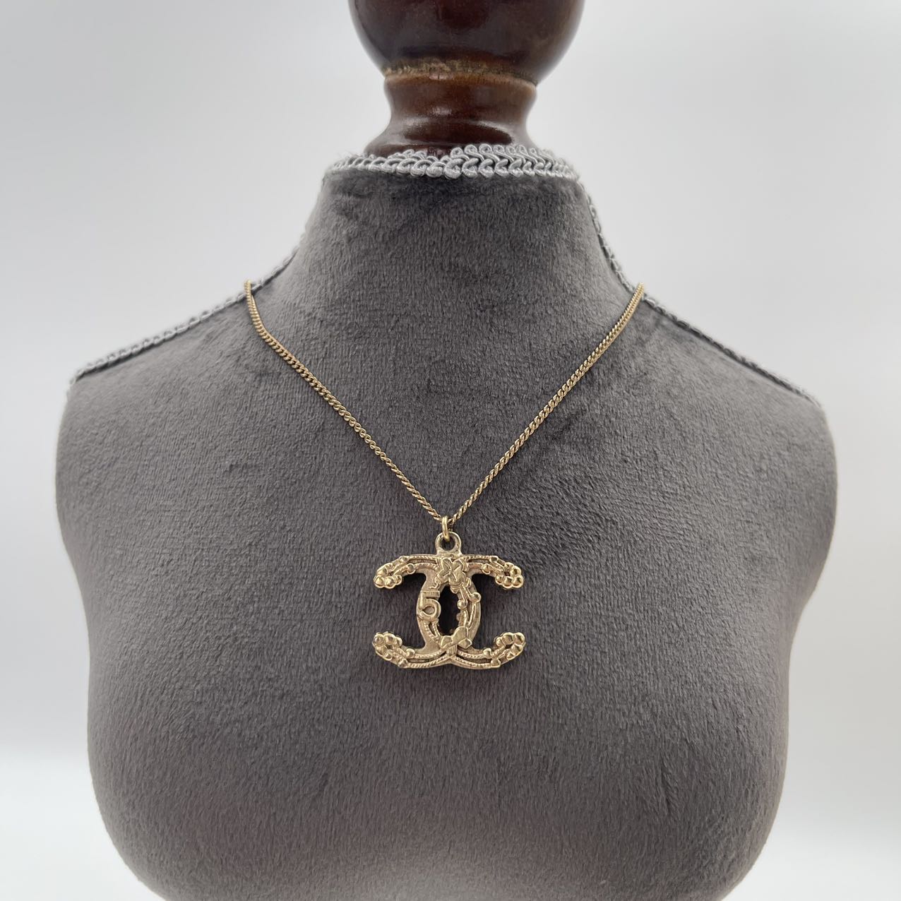 CHANEL Baroque Textured CC Logo Pendant Necklace in Gold Tone [Used]