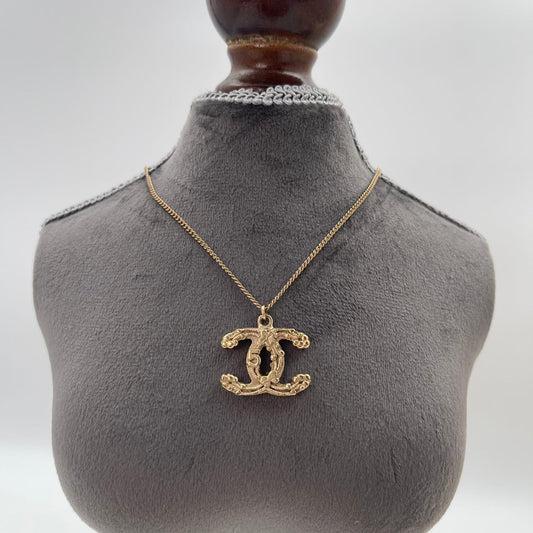 CHANEL Baroque Textured CC Logo Pendant Necklace in Gold Tone [Used]