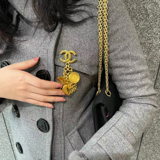 Chanel Vintage 24K Gold-Plated Multi-Motif Charm Statement Brooch [Used]