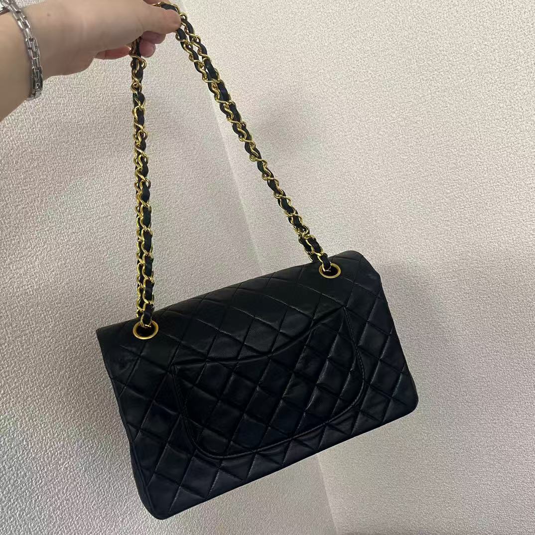 CHANEL Black Caviarskin Classic Double Flap 25 Shoulderbag [Used]