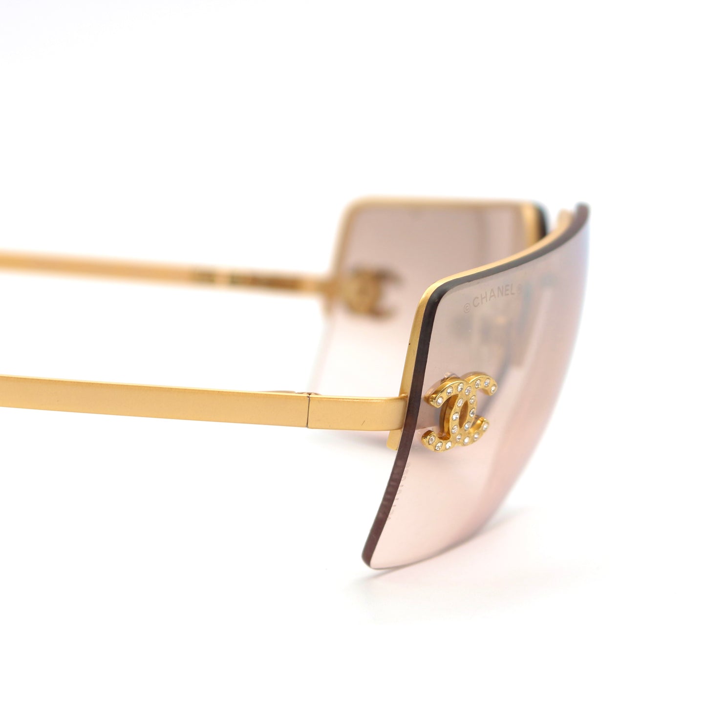 CHANEL Gold Brown Y2K Rimless CC Logo Sunglasses [Used]