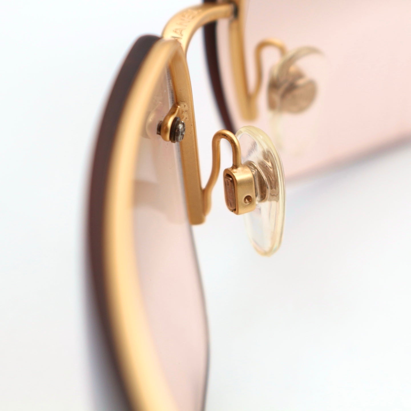 CHANEL Gold Brown Y2K Rimless CC Logo Sunglasses [Used]