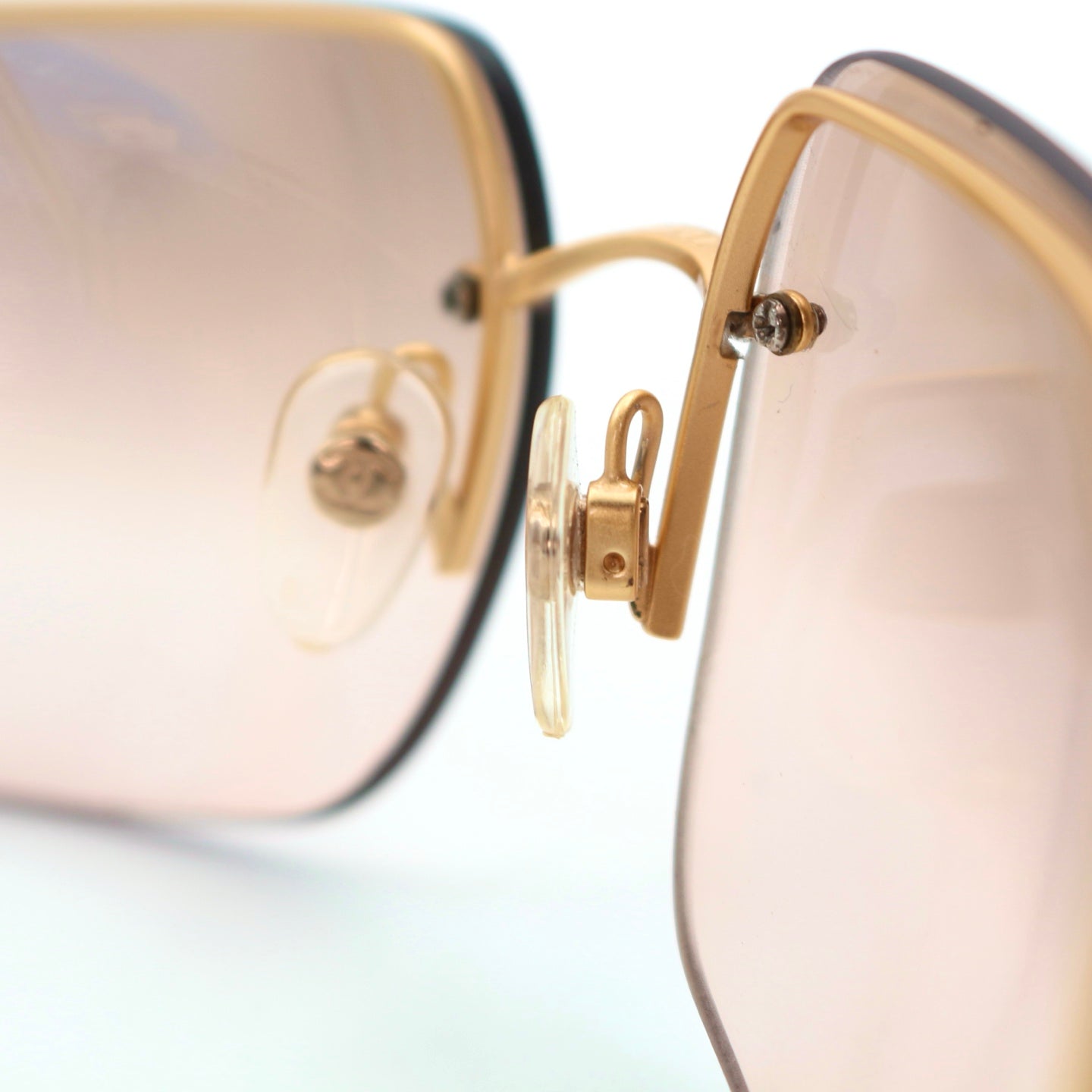 CHANEL Gold Brown Y2K Rimless CC Logo Sunglasses [Used]
