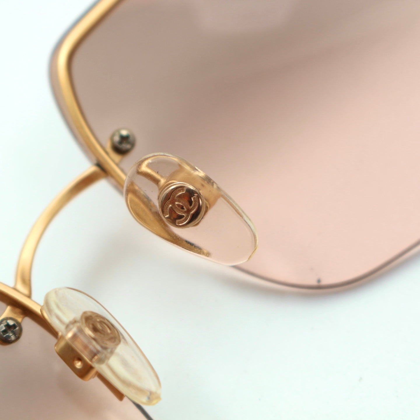 CHANEL Gold Brown Y2K Rimless CC Logo Sunglasses [Used]