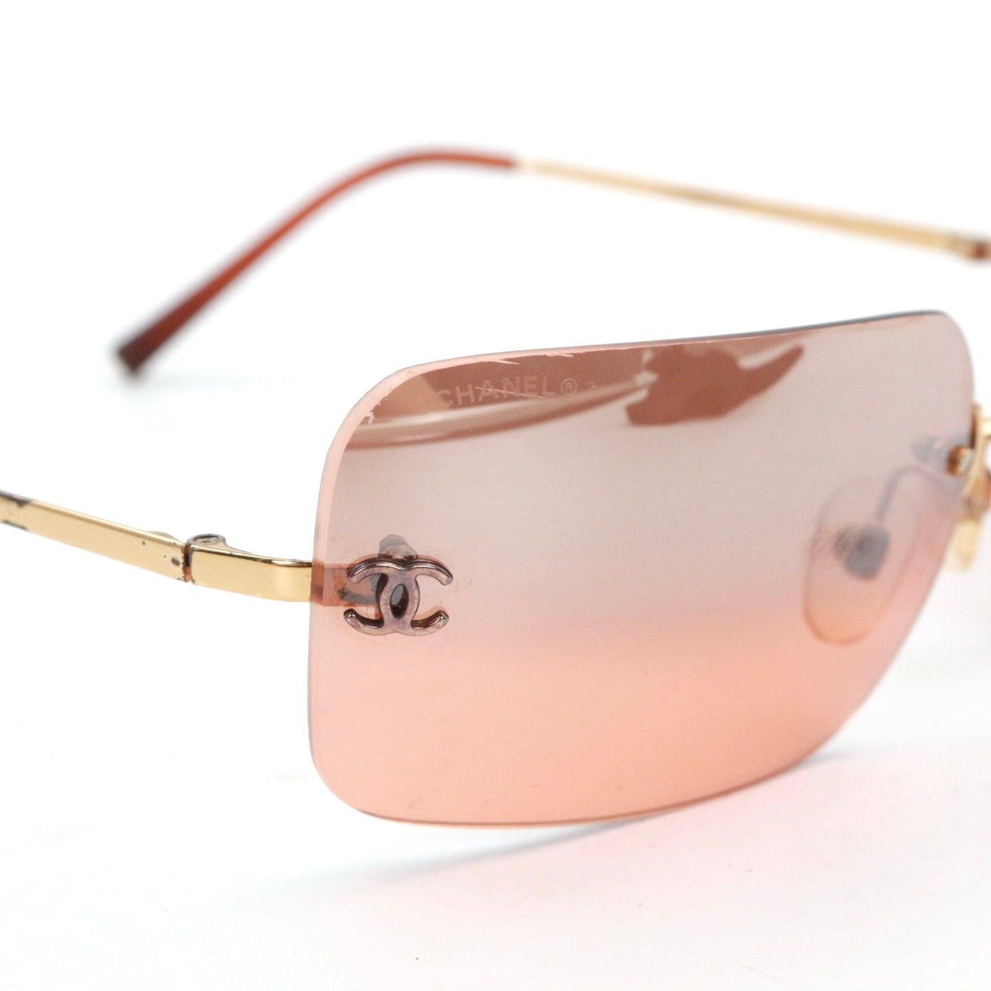 CHANEL Peach Brown Rimless CC Logo Y2K Sunglasses [Used]