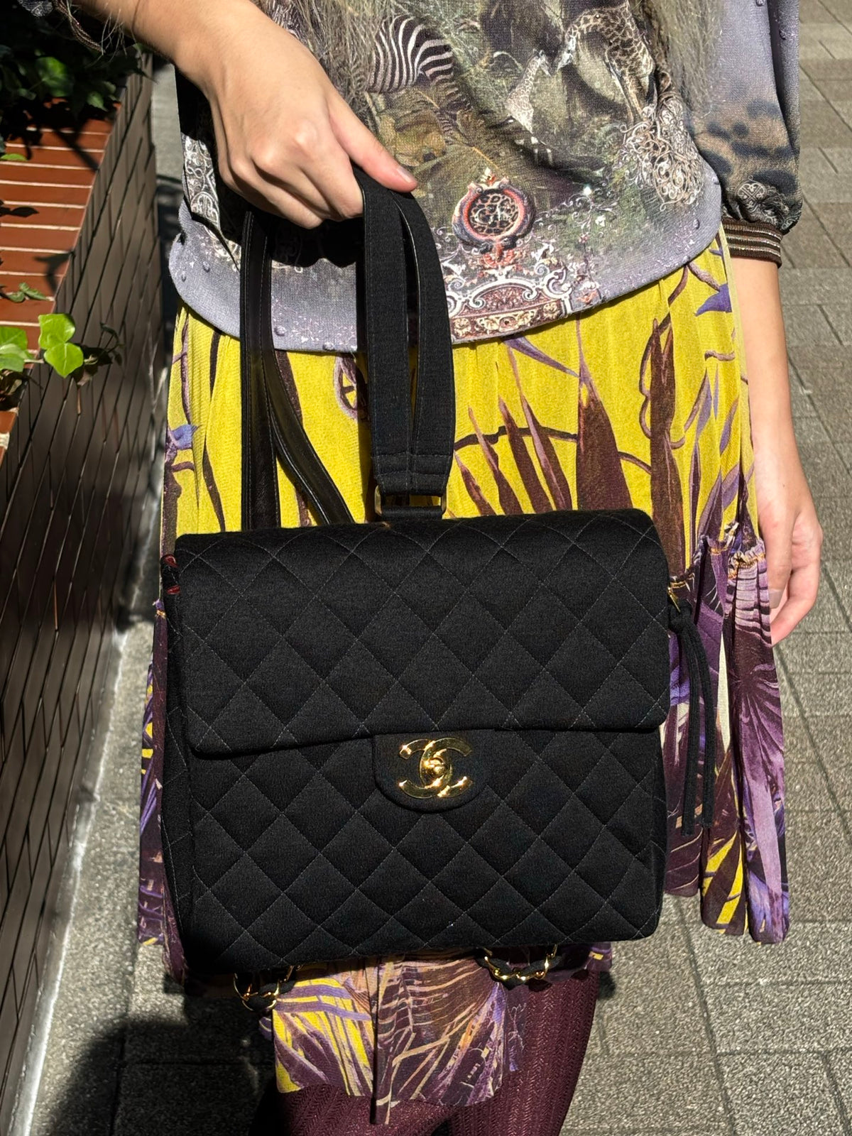 CHANEL Vintage Black Quilted Cotton Double CC Turnlock Backpack [Used]